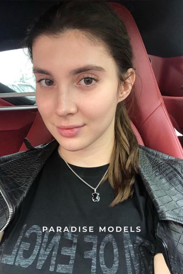 Anessa taking a selfie in a car. 